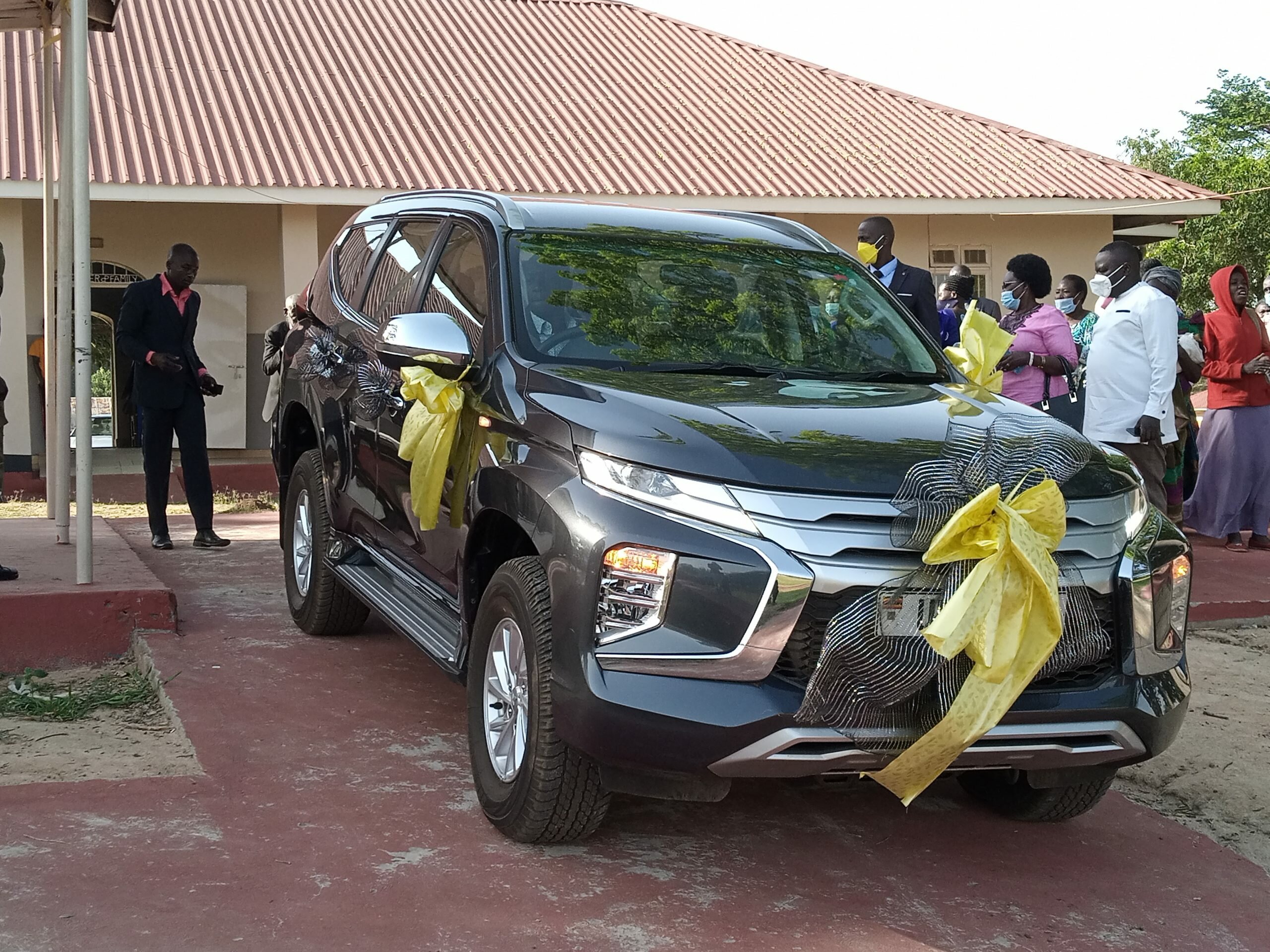 President Gifts Gulu Bishop With Brand New Car